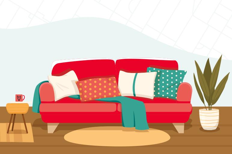 Graphic of a red couch with pillows and decor on it